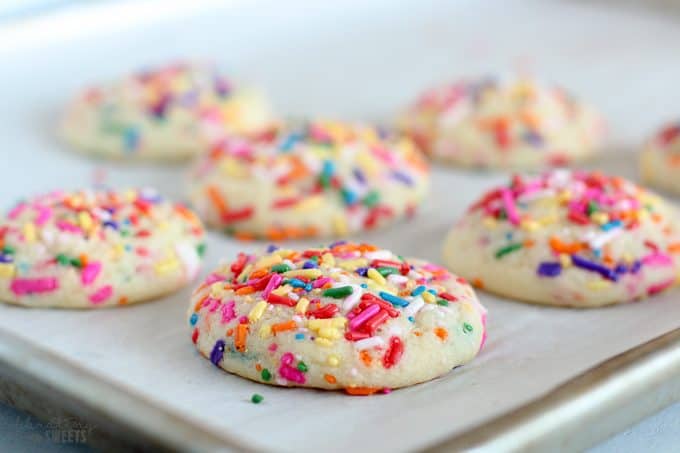 Sprinkle Cookies on a baking sheet.