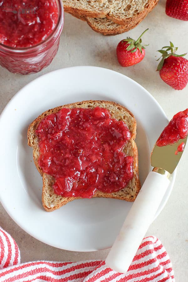 Toast topped with strawberry jam.