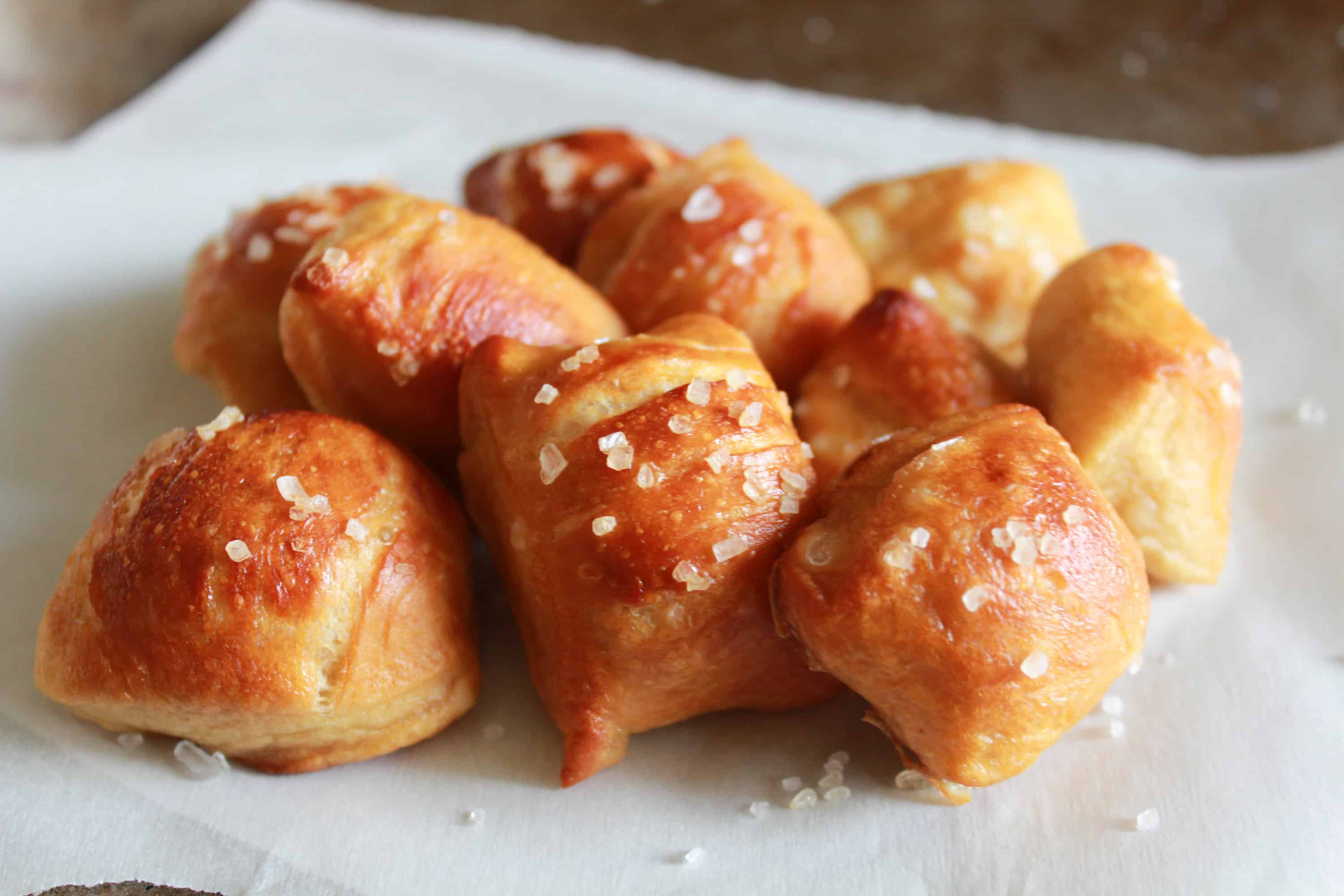 White plate filled with pretzel bites. 