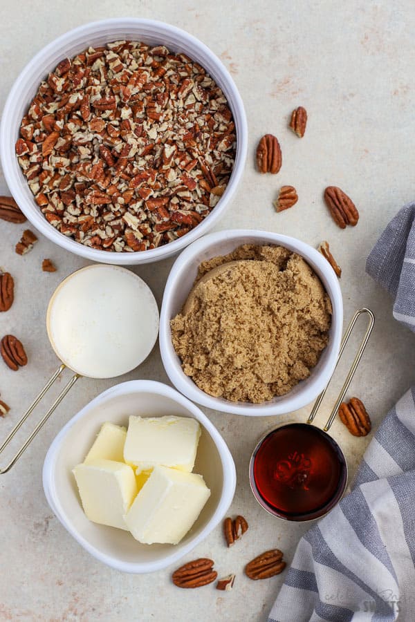 Ingredients for the filling of maple pecan pie bars.