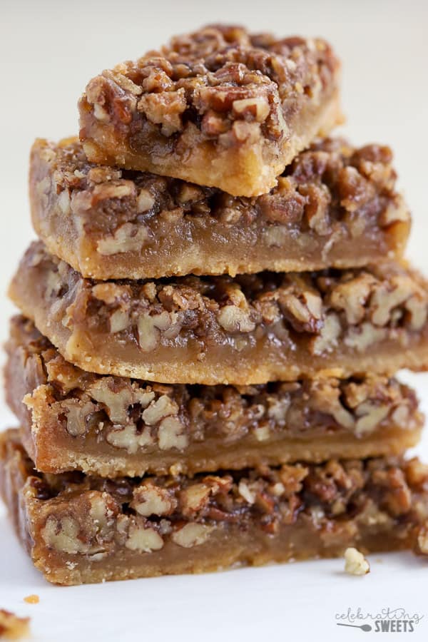 A stack of 5 Maple Pecan Pie Bars stacked 