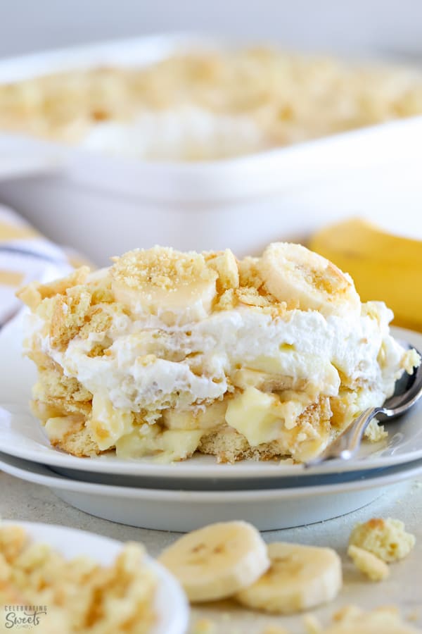 Scoop of homemade banana pudding on a white plate. 