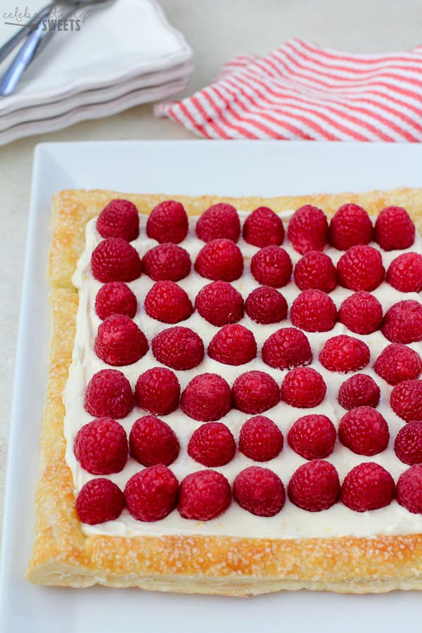 Raspberries on top of a Lemon Tart with Puff Pastry