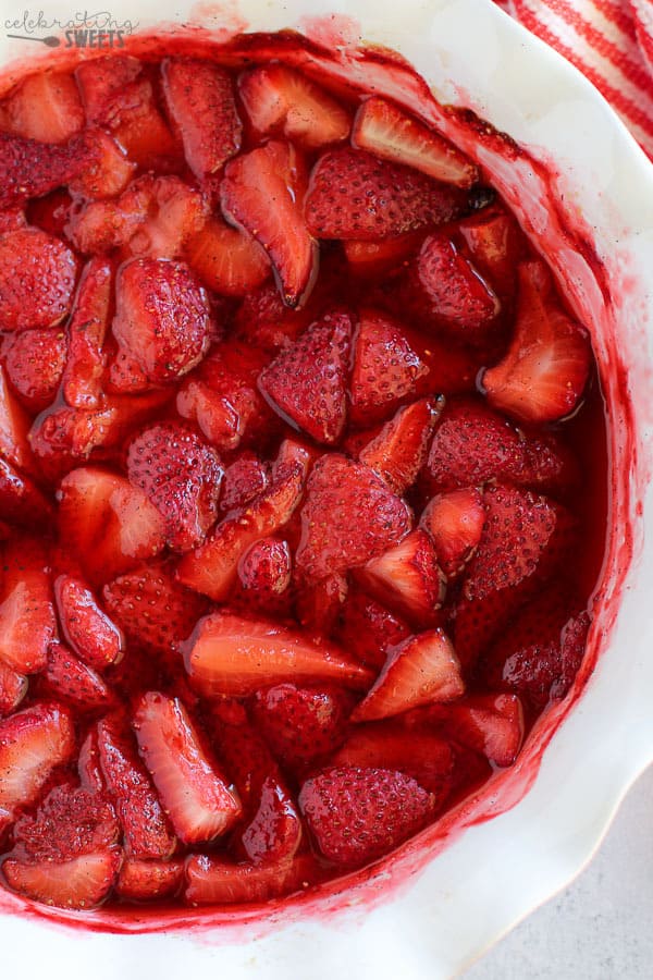 Roasted strawberries in a baking dish.