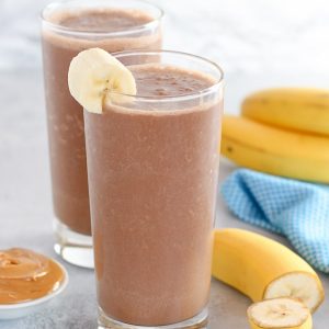 Chocolate peanut butter banana smoothie in a glass