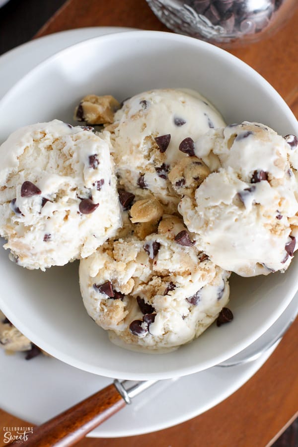 Closeup of cookie dough ice cream in a white bowl.