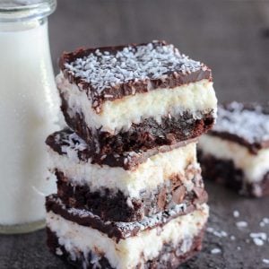 Stack of coconut brownies.