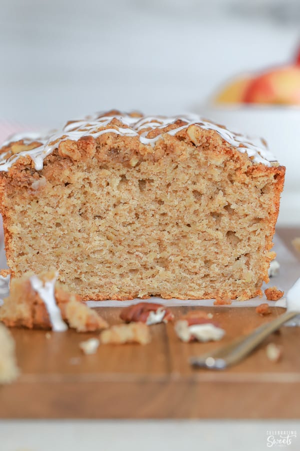 Loaf of Apple Bread topped with icing.