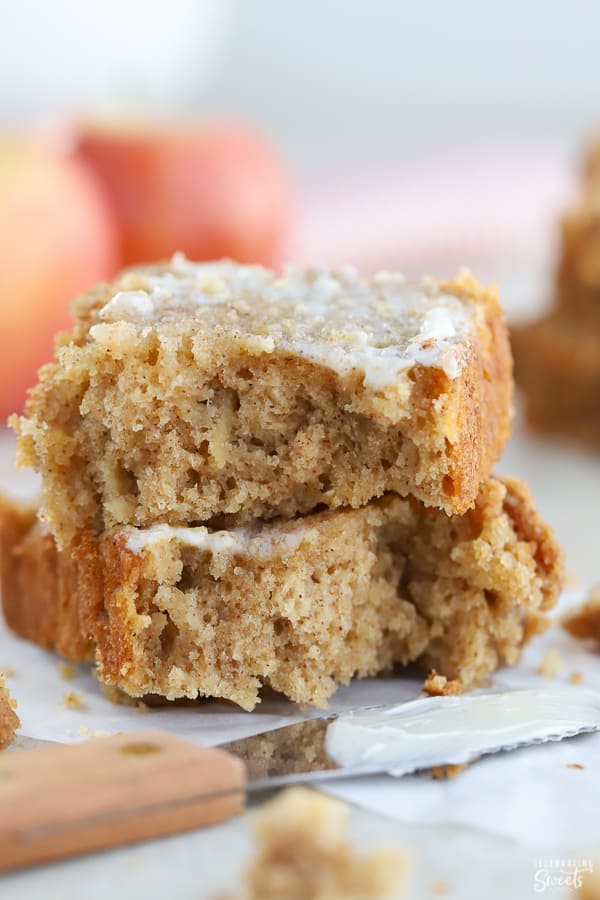 Two slices of apple bread stacked on top of each other. 