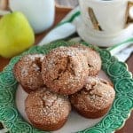 Gingerbread muffins on a white and green plate.