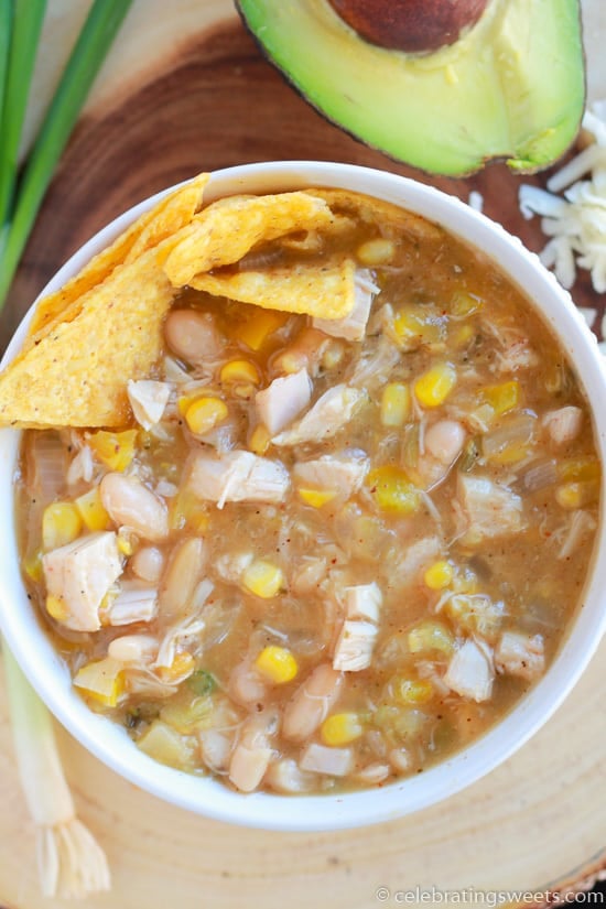 Bowl of chicken chili with tortilla chips. 