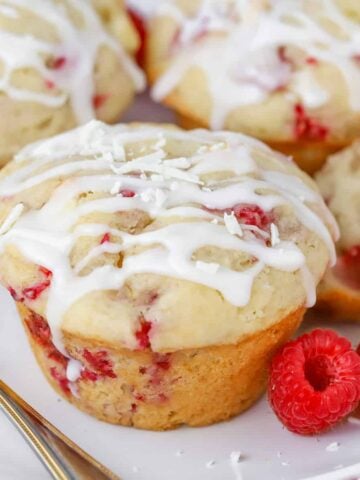 Closeup of Raspberry Muffin with white icing drizzle