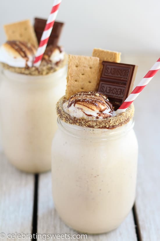 Milkshake topped with toasted marshmallow and chocolate.