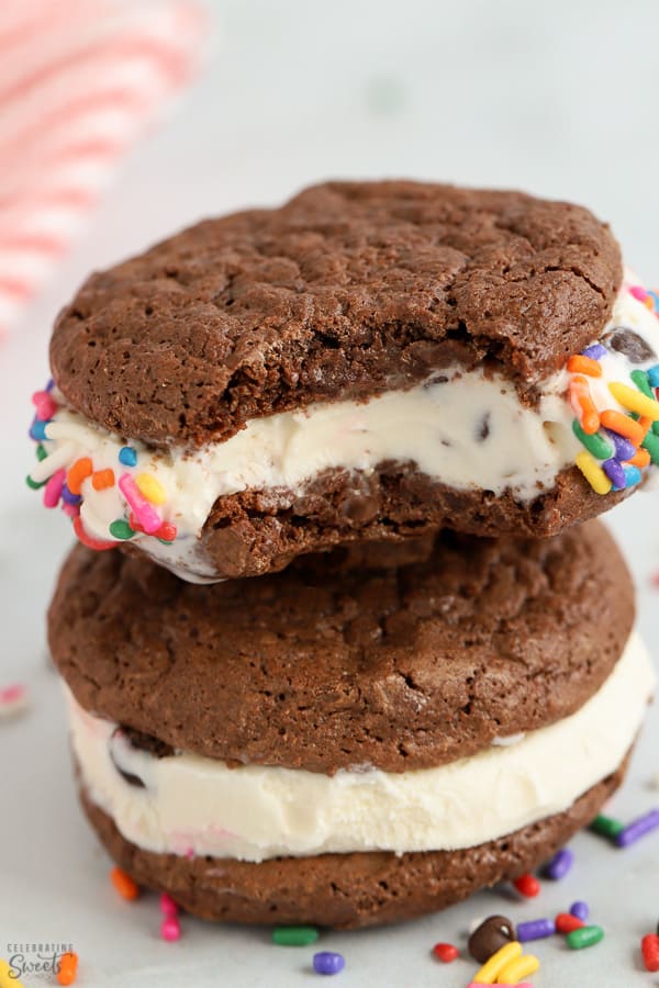 Two brownie ice cream sandwiches stacked on top of each other.