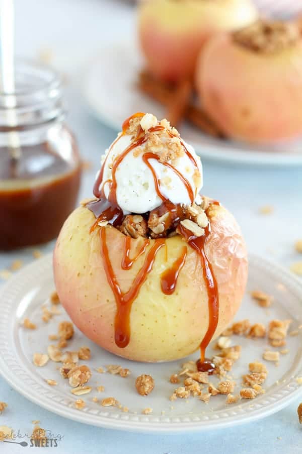 Baked Apple topped with ice cream and caramel sauce.