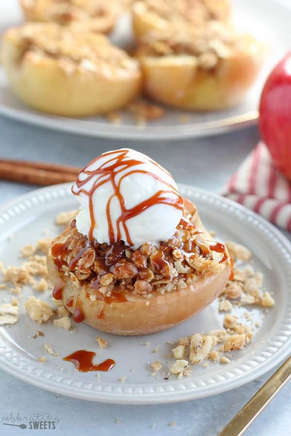 Baked Apple filled with oat crumble and topped with a scoop of vanilla ice cream.
