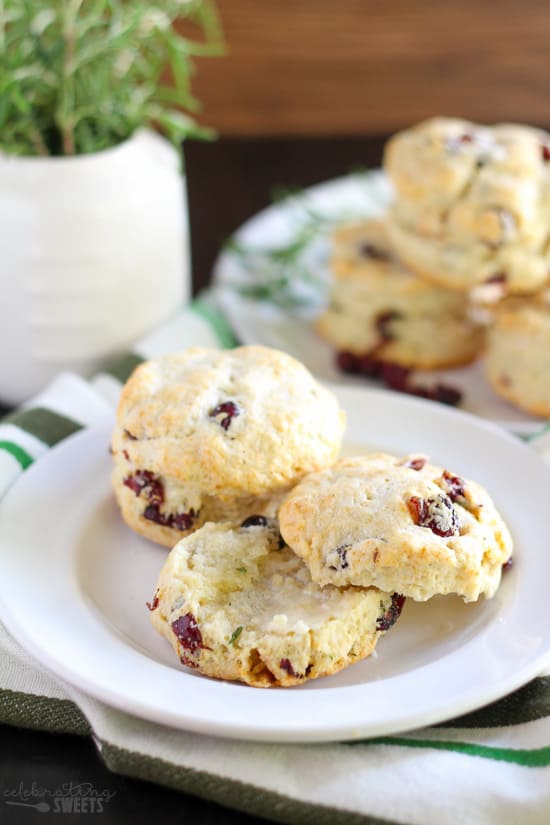 Cranberry muffins on a white plate.