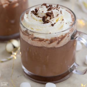 Mug of hot chocolate topped with whipped cream