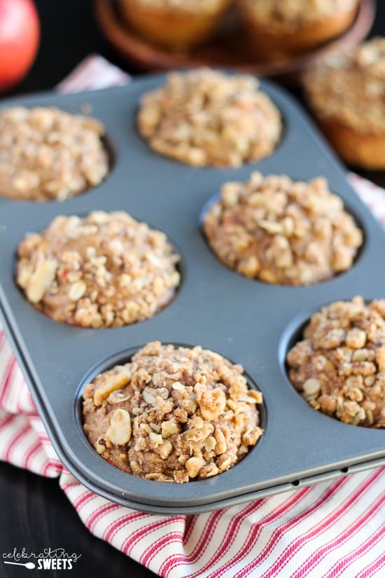 Apple muffins on a muffin tin.