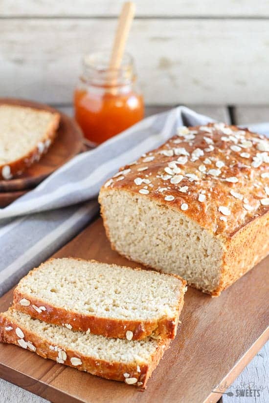 Loaf of bread on a wooden cutting board.