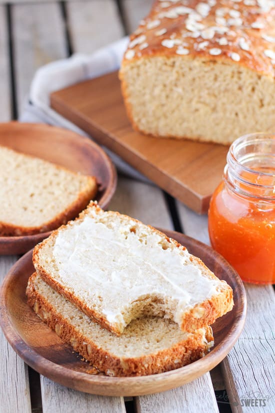 Slices of bread on a wooden plate.