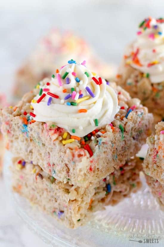 Rice krispies topped with sprinkles and frosting.