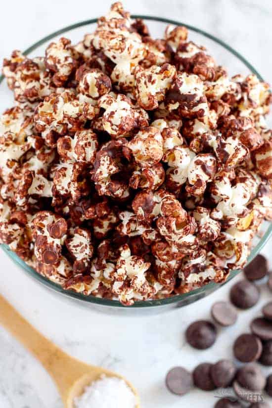 Chocolate popcorn in a glass bowl. 