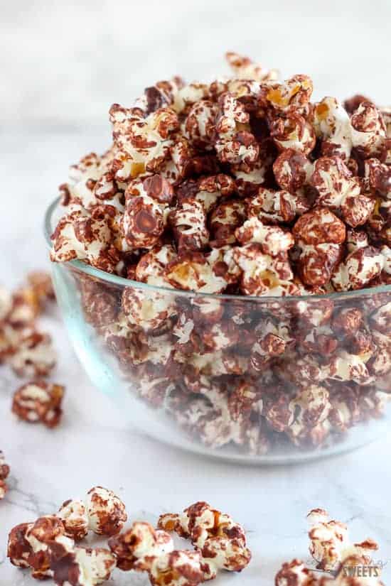 Chocolate popcorn in a glass bowl. 