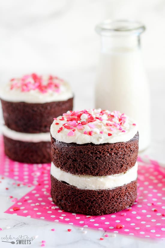 Small double layer chocolate cake with vanilla frosting.