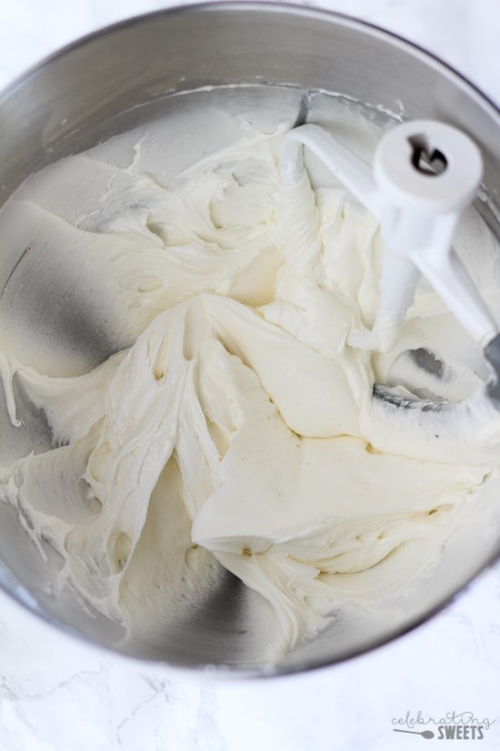 Vanilla frosting in a stainless bowl.