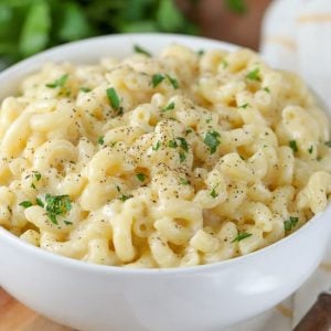 Bowl of macaroni and cheese in a white bowl.