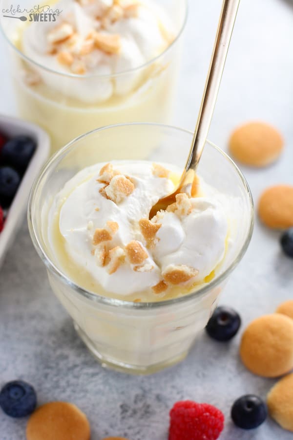 Vanilla pudding topped with whipped cream and crushed cookies.