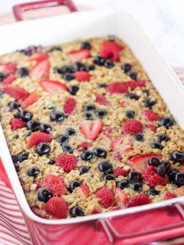 Baked oatmeal topped with berries.