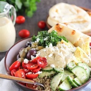 A bowl of salad with Hummus