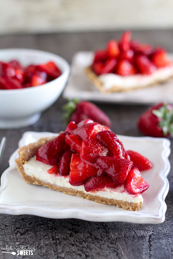 Slice of strawberry pie on a white plate.