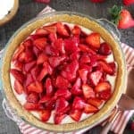 Strawberry pie in a glass pie plate.
