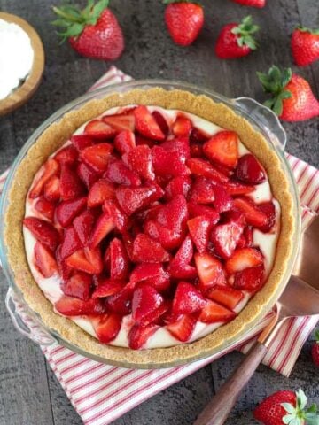 Strawberry pie in a glass pie plate.