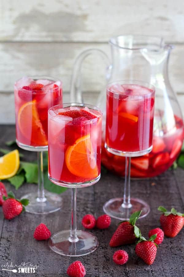 Three glasses of strawberry sangria.