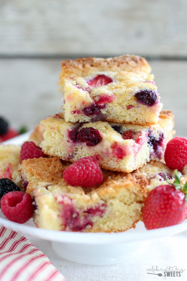Slices of berry cake on a white plate.