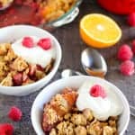 Fruit crisp in white bowls.