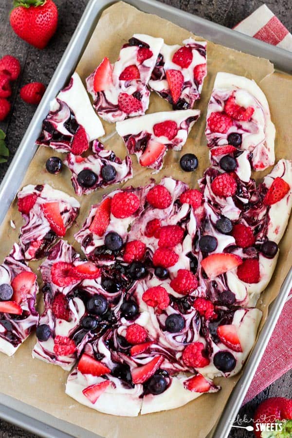 Frozen yogurt bark on a baking sheet.