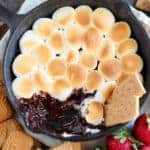 Skillet s'mores dip topped with toasted marshmallows