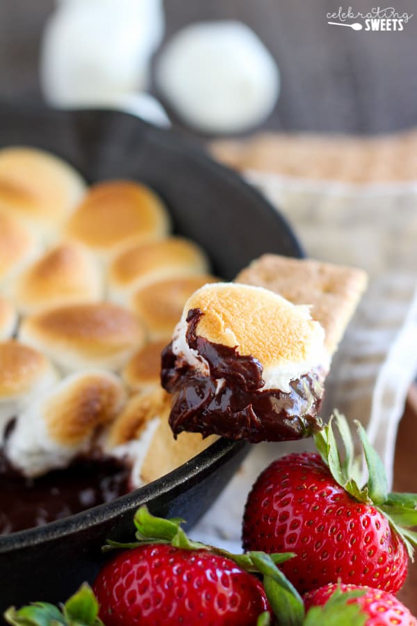 Skillet s\'mores dip topped with toasted marshmallows.