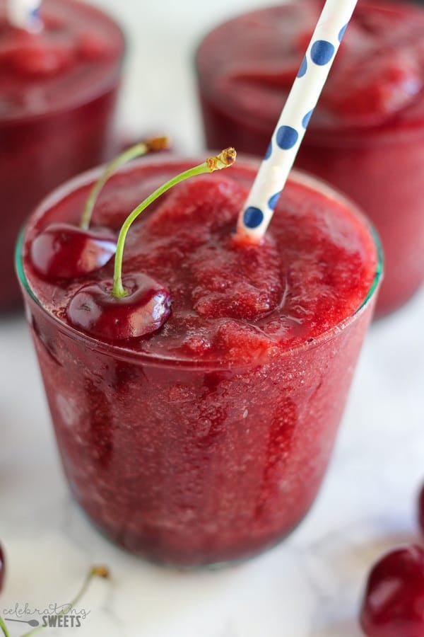 Close up of cherry daiquiri in a glass.