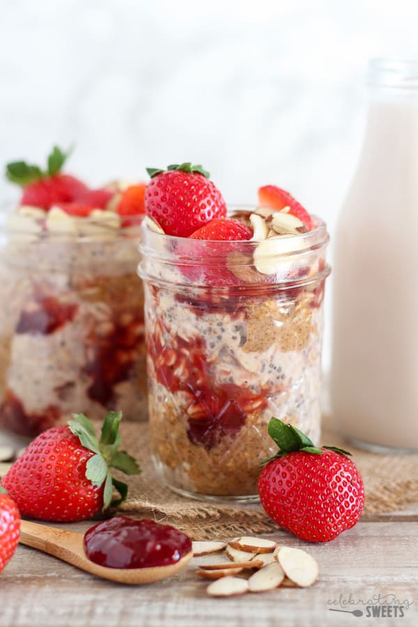 Overnight oats in a jar with strawberries and almond butter. 