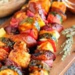 Skewers with grilled sausage and vegetables.