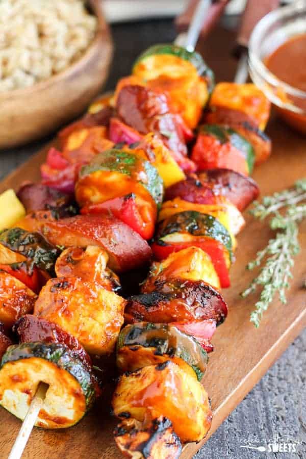 Skewers with grilled sausage and vegetables. 