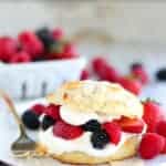 Shortcake filled with mixed berries and whipped cream.