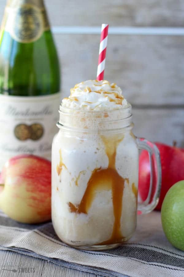 Apple cider float in a mason jar with caramel sauce. 