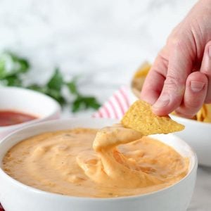 Queso dip and tortilla chips.